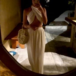 tan cross body top and flowy pant set.